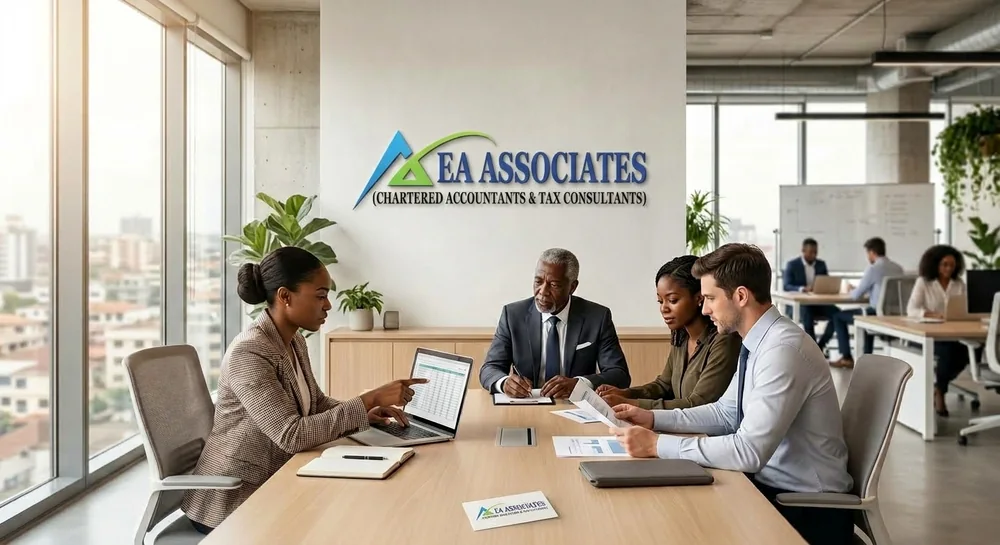 An EA Associates Ghana engagement team working through a client file in the firm's Accra office.